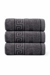 Three folded dark gray towels with a subtle pattern on a white background